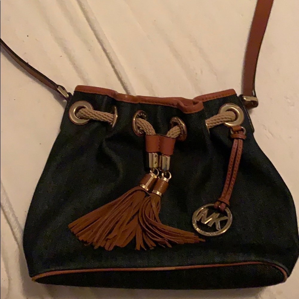 Denim and brown Micheal Kors purse barely worn